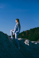 Wall Mural - Fashion woman wearing white clothes outdoor on the beach