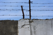 Wall With Barbed Wire Protection