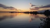 Fototapeta Przestrzenne - Sunset over the river with reflection