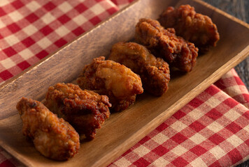 Wall Mural - Breaded and Fried Oysters on a Rustic Wooden Table