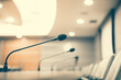 © Eakrin - Close up the conference microphone at board room for meeting speaker and workshop presentation concepts
