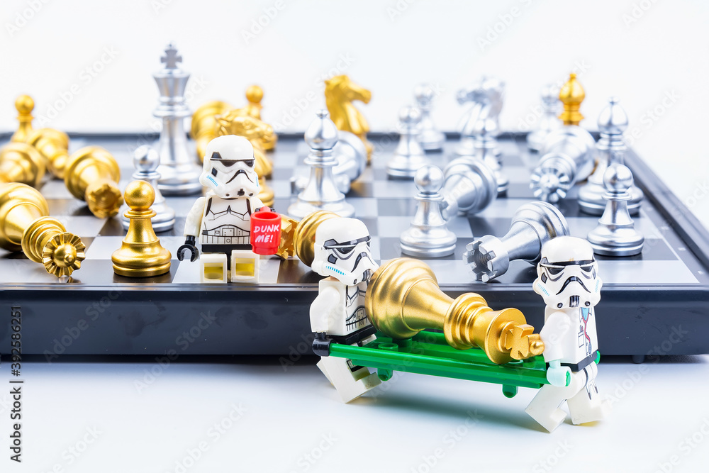 Stock Foto Bangkok Thailand November 13 2020 Lego Star Wars is helping to carry chess pieces off the board to rescue at Bangkok Thailand Adobe Stock