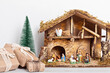 Christmas hygge interior with christmas nativity scene with holy family