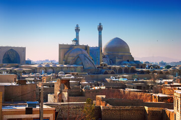 Isfahan, Iran (Persia), Middle East. Awesome city view, medieval buildings, ancient Jameh (Jame, Masjid) Mosque and traditional orient houses at the background of morning sky at sunrise time