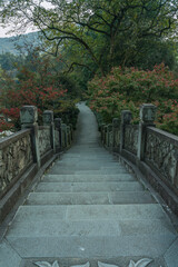  A Chinese stone bridge at the lakeside of West lake in Hangzhou, China, autumn time.