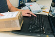 © Marcela Ruty Romero - Shipping shopping online, Young start up small business, Seller prepare parcel box of product for deliver to customer, Online selling or e-commerce.