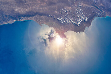 Wall Mural - earth's crust from the iss. the spaceship is flying over argentina. the artist transformed the origi