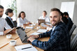 © Prostock-studio - Happy Businessman With Laptop At Corporate Meeting In Office