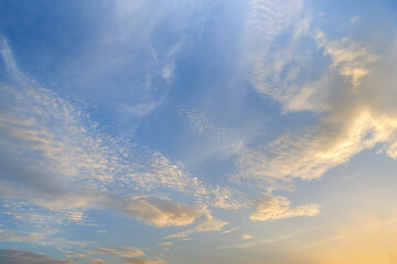 Wall Mural - landscape fantastic sunset or sunrise with rays of light through the sky. beautiful white clouds and
