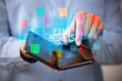 © ra2 studio - Young man holding a foldable smartphone with EXAM RESULTS inscription, educational concept