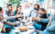 © Mirko Vitali - Friends having fun drinking and eating at coffeehouse - Young people talking together at restaurant cafeteria - New normal lifestyle concept with happy men and women at cafe bar - Bright azure filter