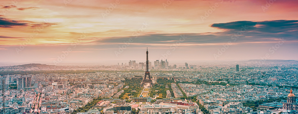aerial view over Paris at sunset with iconic Eiffel tower - obrazy, fototapety, plakaty 