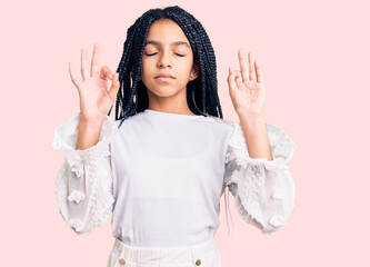 Sticker - Cute african american girl wearing casual white tshirt relax and smiling with eyes closed doing meditation gesture with fingers. yoga concept.