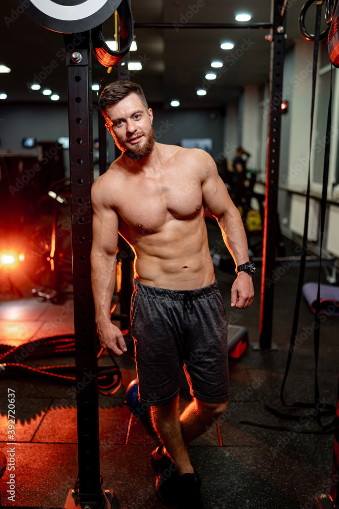 strong-athletic-man-fitness-model-guy-with-nacked-torso-showing-six