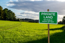 Private Land No Public Right Of Way Saying Sign, Beautiful, Inviting Lush Open Grassland Behind, Farmers Taking Lands And Prohibit The Entry For Public Walks Or Hiking, Human Greed To Own The Grounds