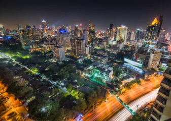 Wall Mural - Panoramic View of Bangkok, Thailand. Cityscape with Public Park and Skyscrapers at Night