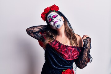 Sticker - Young woman wearing day of the dead costume over white suffering of neck ache injury, touching neck with hand, muscular pain