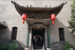 © anhong - Traditional Chinese architecture courtyard door decoration.