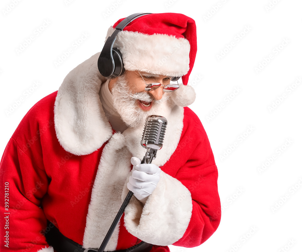 Cool Santa Claus with microphone singing Christmas song on white background