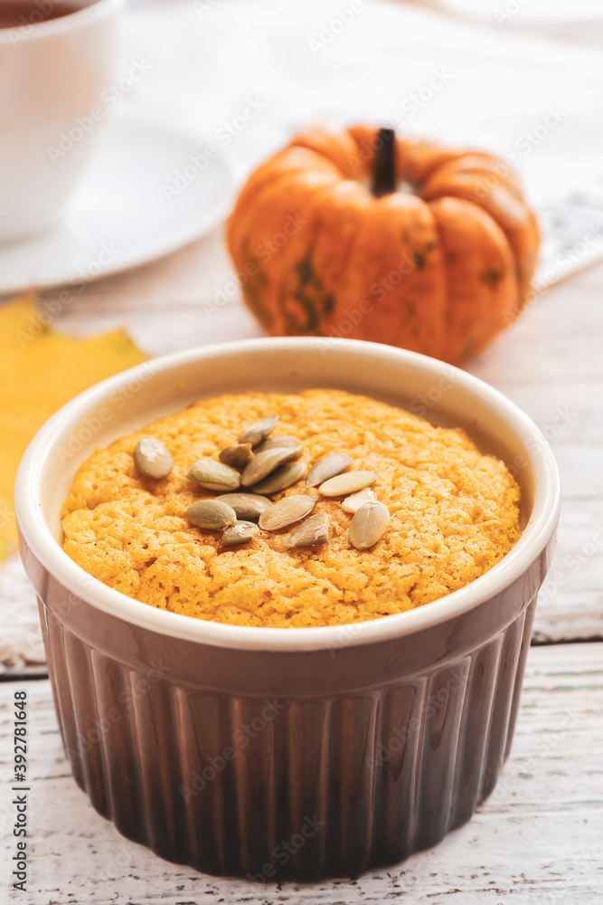 Tasty pumpkin pudding on table