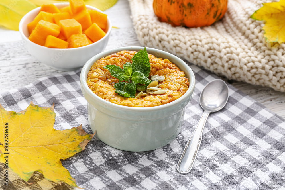 Tasty pumpkin pudding on table