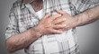 © andranik123 - Man holding his chest suffering from heart attack.