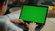 © stockbusters - Boy surfing internet green screen laptop. Student typing keyboard mockup netbook