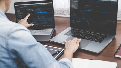 Wall Mural - programmer working in a software development and coding technologies. website design. technology con