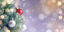 Background From A Christmas Tree With Balls On Purple Background And Golden Lights