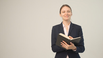 Wall Mural - woman in a jacket with a notebook