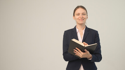 Canvas Print - woman in a jacket with a notebook