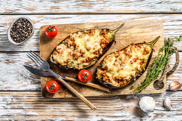 Wall Mural - Baked eggplant with minced beef meat and cheese. White background. Top view