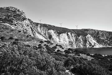 Canvas Print - rocky coast and windmills on a hill on the island of Kefalonia