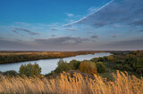 Fototapeta Tęcza - Panorama of the Russian Oka river before sunset on a clear autumn day.