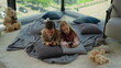 © stockbusters - Siblings using smartphones home. Nice kids gaming mobile phones.