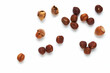 Creative layout made from forest hazelnut on the white background. Flat lay. Food concept. Macro concept.