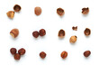 Creative layout made of forest hazelnut on the white background. Flat lay. Food concept. Macro concept.