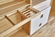 © timltv - Modern wardrobe with slide out rack for coathangers. Detail of modern furniture