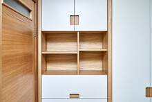 Modern Wardrobe With Finger Pull Design. Wooden Wardrobe With Light Gray Cabinet Doors. Modern Furniture