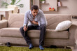 © Elnur - Young drunk man suffering at home