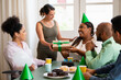 © Vergani Fotografia - Lovely business colleagues give a gift box to female co-worker in coworking office. Colleagues, celebration, party, birthday, cheers concept..
