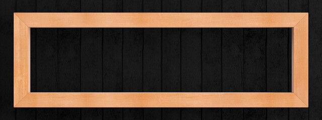 Sticker - Picture of natural wood slats on a background of matte black boards. Wide version.