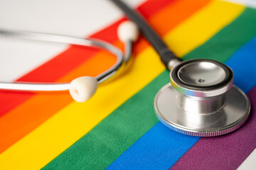 Black stethoscope on rainbow background, symbol of LGBT pride month  celebrate annual in June social, symbol of gay, lesbian, gay, bisexual, transgender, human rights and peace.