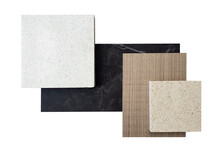 Top View ,composition Of Interior Finishing Material Including White And Beige Grained Quartz Stone ,ash Wood Veneer ,black Cosmos  Quartzite Stone Samples Isolated On White Background.