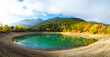 © Denys - Turquoise lake in early autumn October hiking trip