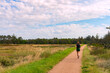 © kwarner - A person jogging in nature.