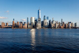 Fototapeta Nowy Jork - New York City Manhattan skyline daytime with One World Trade Center Tower (Freedom Tower)over Hudson River viewed from New Jersey