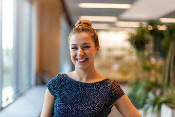 Portrait of an young businesswoman in a modern office 
