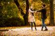 © BGStock72 - Young couple having fun in the autumn park