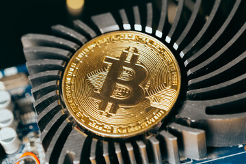 Wall Mural - Gold bitcoin and new virtual money for the electronic processor. Cryptocurrency concept.
